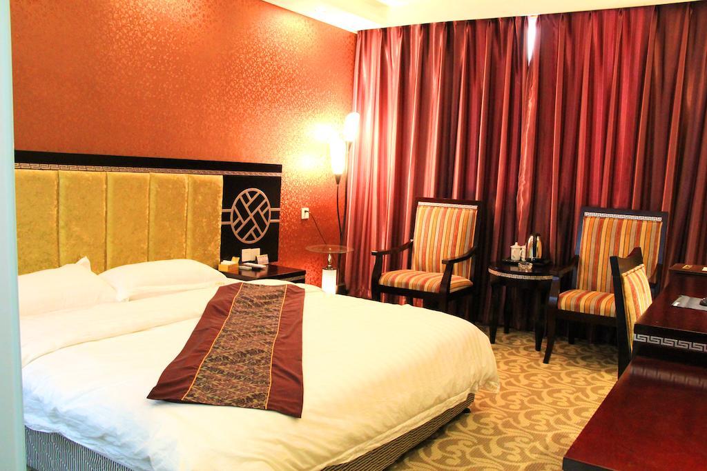 Jiuxiang Hotel Jiuzhaigou Rom bilde