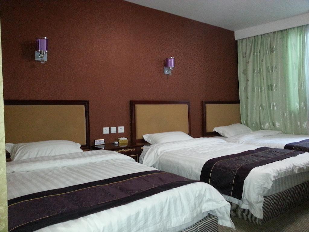 Jiuxiang Hotel Jiuzhaigou Rom bilde
