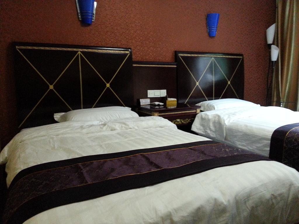 Jiuxiang Hotel Jiuzhaigou Rom bilde