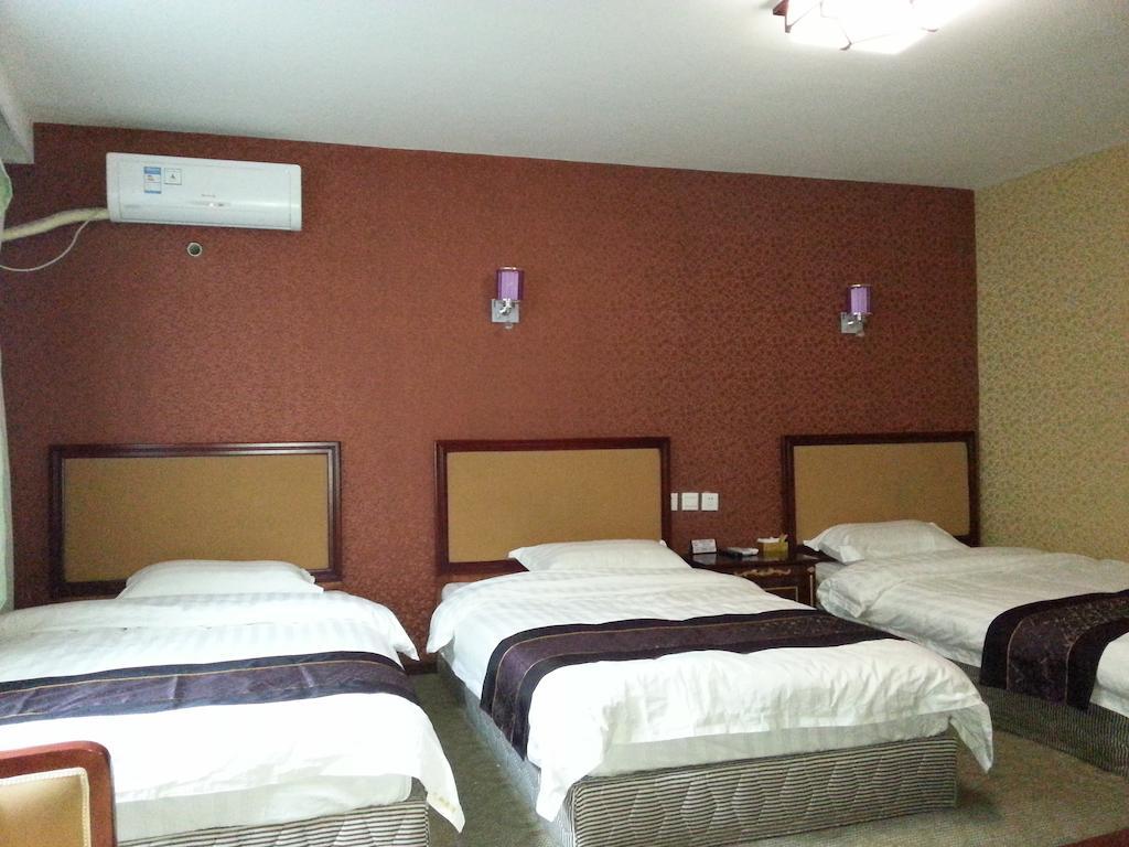 Jiuxiang Hotel Jiuzhaigou Rom bilde