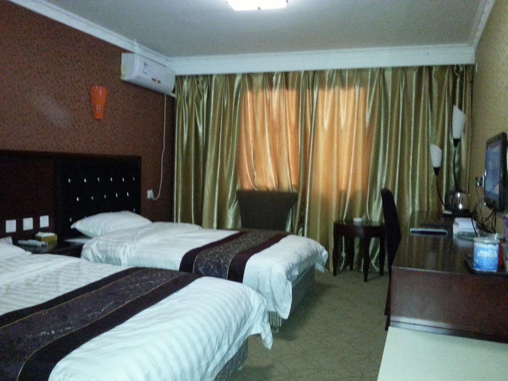 Jiuxiang Hotel Jiuzhaigou Rom bilde