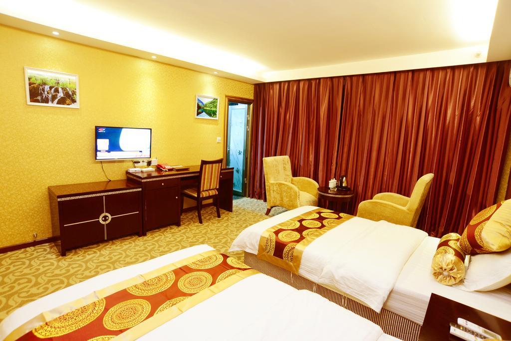 Jiuxiang Hotel Jiuzhaigou Rom bilde