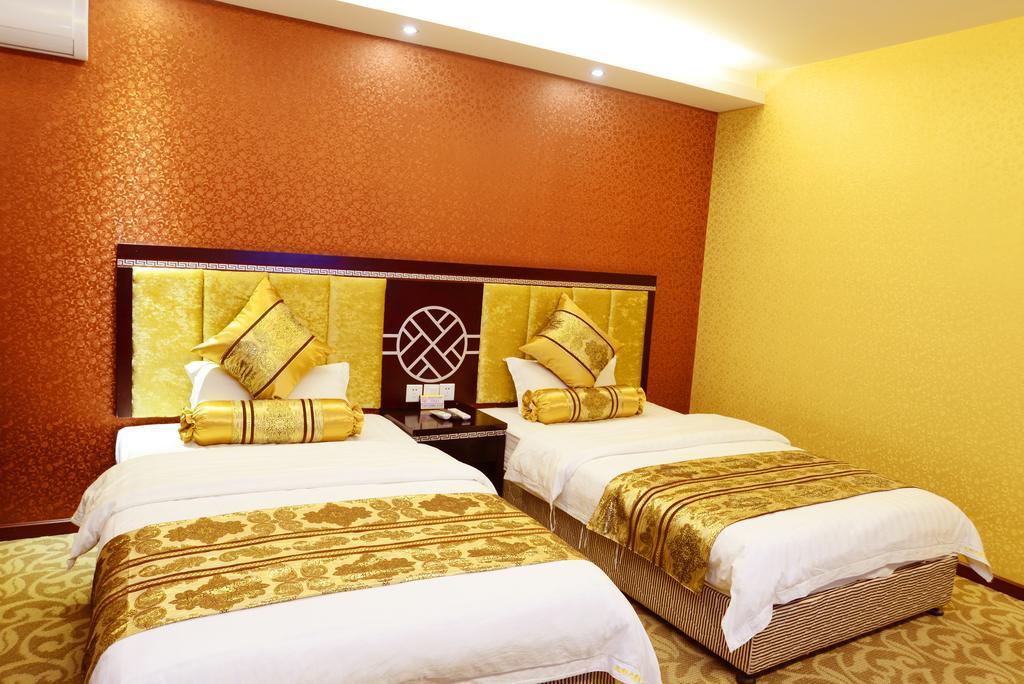 Jiuxiang Hotel Jiuzhaigou Rom bilde