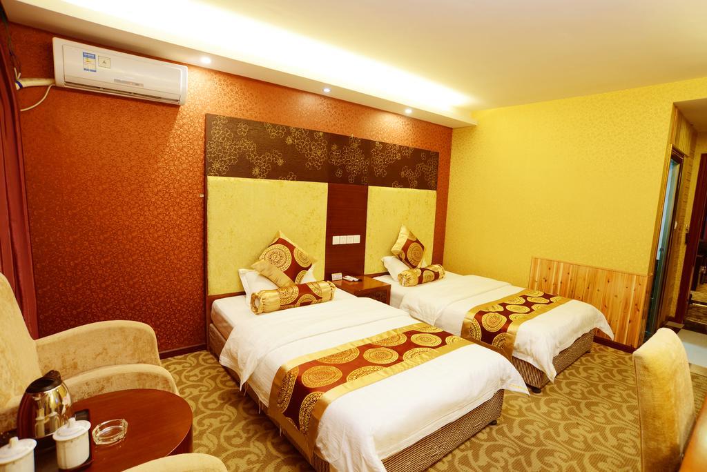 Jiuxiang Hotel Jiuzhaigou Rom bilde